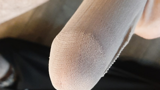 Schwanz in Nylon gehüllt