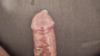 Gummimuschi mit Kondom